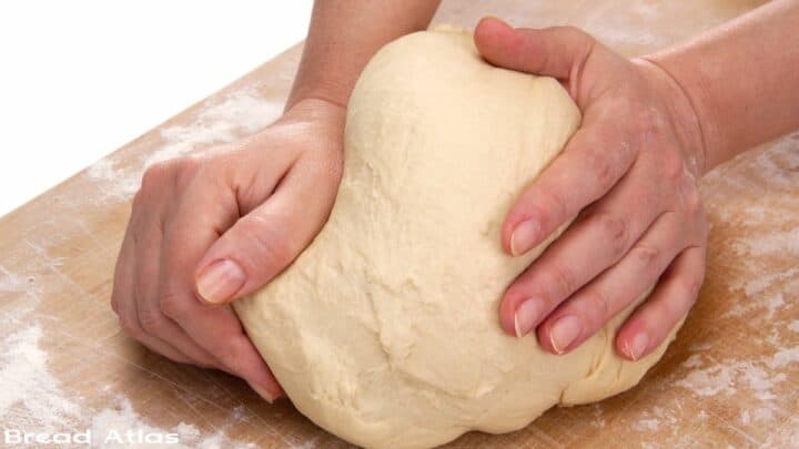 Step showing kneading of dough.